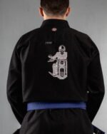 Skull Biker embroidery on the back of a black BJJ Gi