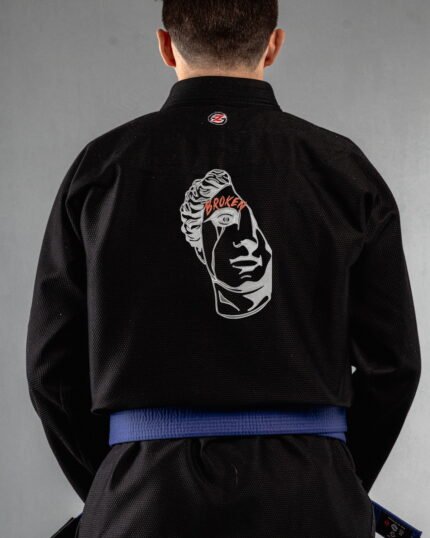 Broken Greek Statue embroidery on the back of a black BJJ Gi
