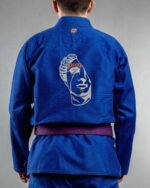 Broken Greek Statue embroidery on the back of a blue BJJ Gi