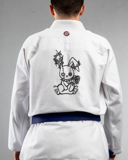 Bunny With Rose Minimal embroidery on the back of a white BJJ Gi