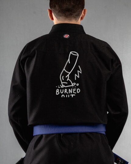 Burned Out embroidery on the back of a black BJJ Gi