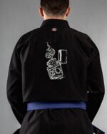 Bruning Lighter embroidery on the back of a black BJJ Gi