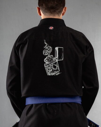 Bruning Lighter embroidery on the back of a black BJJ Gi