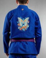 Butterfly 2 Glowing embroidery on the back of a blue BJJ Gi
