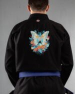 Butterfly embroidery on the back of a black BJJ Gi