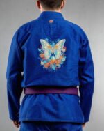 Butterfly embroidery on the back of a blue BJJ Gi