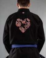 Butterfly Love embroidery on the back of a black BJJ Gi