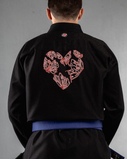 Butterfly Love embroidery on the back of a black BJJ Gi