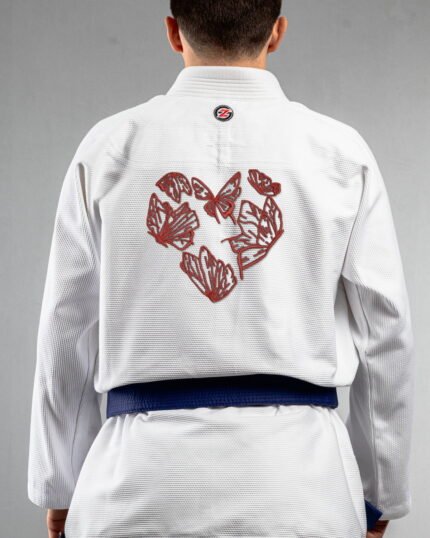 Butterfly Love embroidery on the back of a white BJJ Gi