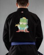 Cash King embroidery on the back of a black BJJ Gi