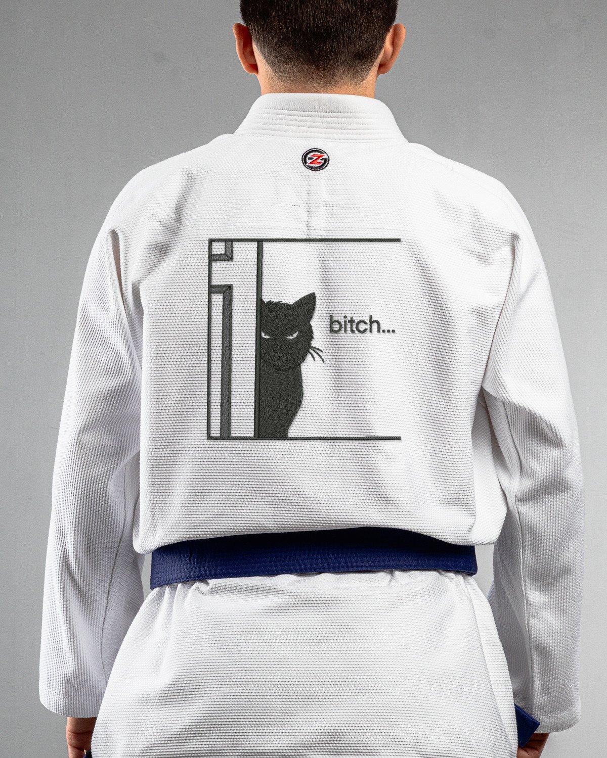 Cat Bitch white Gi back mockup Cat Bitch embroidery on the back of a white BJJ Gi