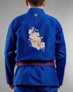 Cherry Blossom embroidery on the back of a blue BJJ Gi