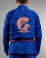 Cherry Blossom X Moon embroidery on the back of a blue BJJ Gi