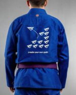 Create Your Own Path embroidery on the back of a blue BJJ Gi