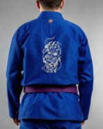 Dark Oni Mask embroidery on the back of a blue BJJ Gi