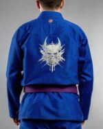 Demon Skull ,demon Head embroidery on the back of a blue BJJ Gi