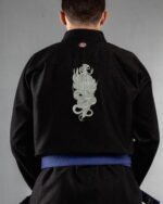 Demon Knife embroidery on the back of a black BJJ Gi