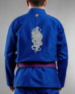 Demon Knife embroidery on the back of a blue BJJ Gi