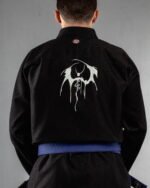 Devil embroidery on the back of a black BJJ Gi