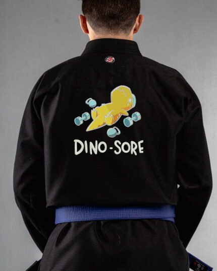 Dino Sore embroidery on the back of a black BJJ Gi