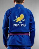 Dino Sore embroidery on the back of a blue BJJ Gi