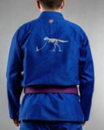 Beast On Leash embroidery on the back of a blue BJJ Gi