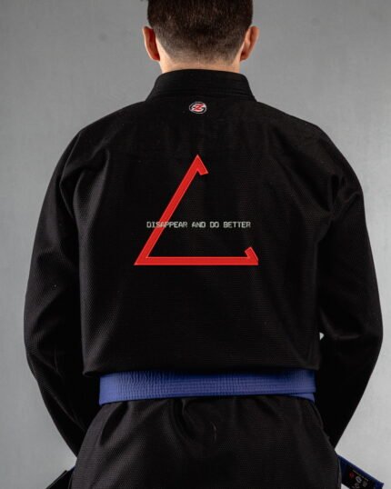 Disappear & Do Better embroidery on the back of a black BJJ Gi