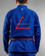 Disappear & Do Better embroidery on the back of a blue BJJ Gi