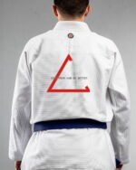 Disappear & Do Better embroidery on the back of a white BJJ Gi