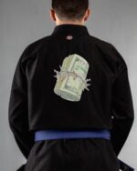 Dollar embroidery on the back of a black BJJ Gi