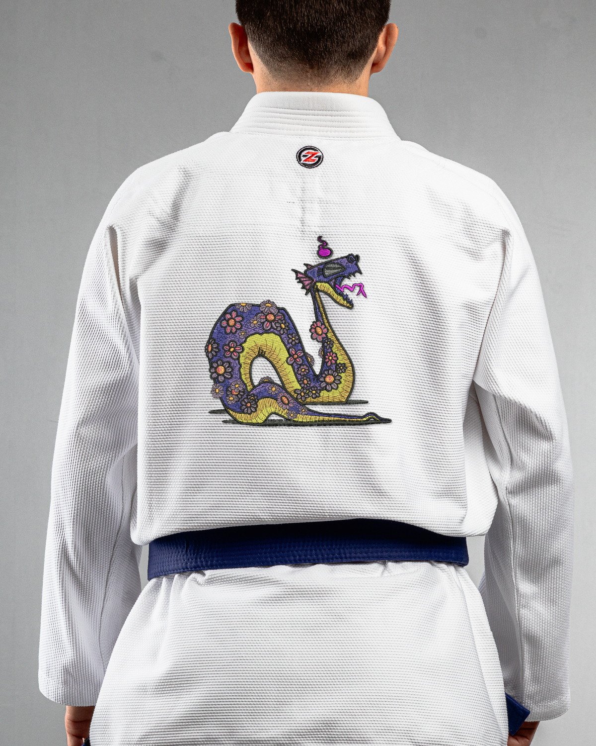 Doodle Snake white Gi back mockup Doodle Snake embroidery on the back of a white BJJ Gi