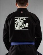 Dreamer embroidery on the back of a black BJJ Gi
