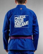 Dreamer embroidery on the back of a blue BJJ Gi