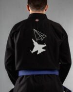 Dreamer embroidery on the back of a black BJJ Gi