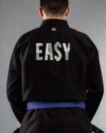 Easy Money embroidery on the back of a black BJJ Gi