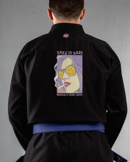 Take It Easy embroidery on the back of a black BJJ Gi
