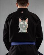 Eat What embroidery on the back of a black BJJ Gi