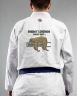 Energy Loading embroidery on the back of a white BJJ Gi