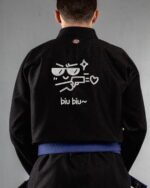 Expression embroidery on the back of a black BJJ Gi