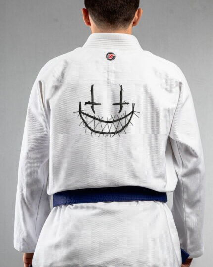 Face (10) Files embroidery on the back of a white BJJ Gi
