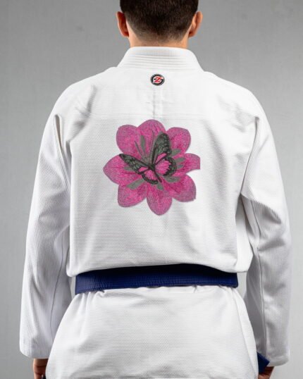 Petals & Wings embroidery on the back of a white BJJ Gi