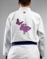 Butterfly Bloom embroidery on the back of a white BJJ Gi