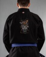 Glitched Skull embroidery on the back of a black BJJ Gi