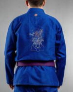 Glitched Skull embroidery on the back of a blue BJJ Gi