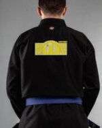Good Vibes embroidery on the back of a black BJJ Gi