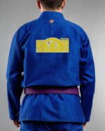 Good Vibes embroidery on the back of a blue BJJ Gi