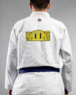 Good Vibes embroidery on the back of a white BJJ Gi