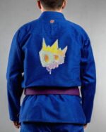 Graffiti Skull King embroidery on the back of a blue BJJ Gi