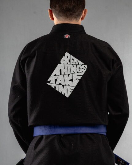 Great Things Take Time embroidery on the back of a black BJJ Gi