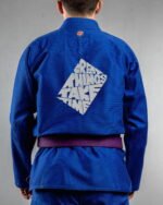 Great Things Take Time embroidery on the back of a blue BJJ Gi